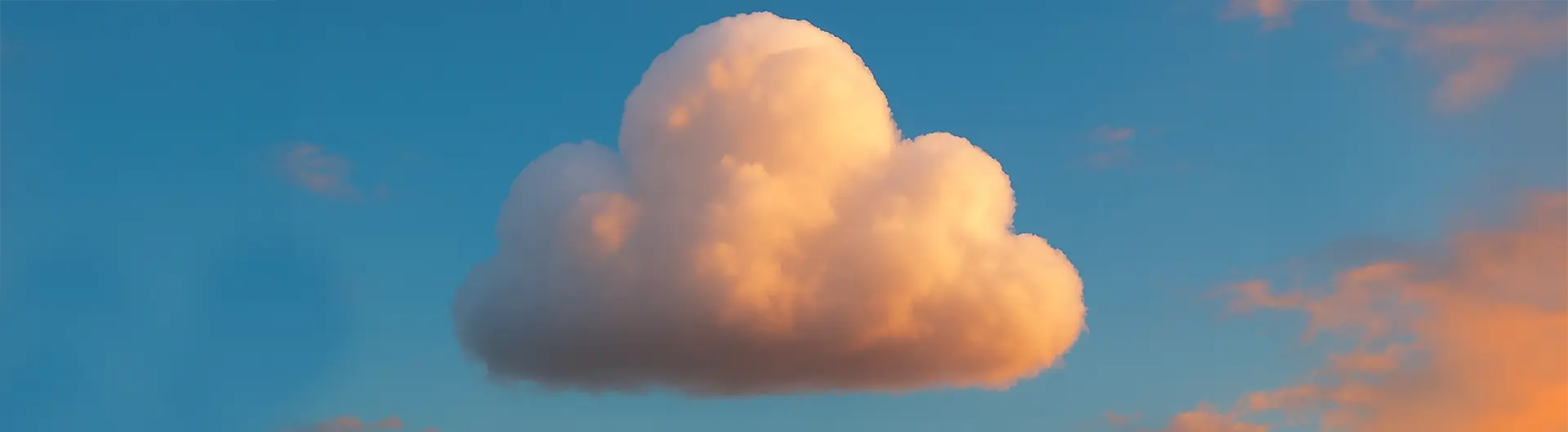 Billowing cloud at sunset