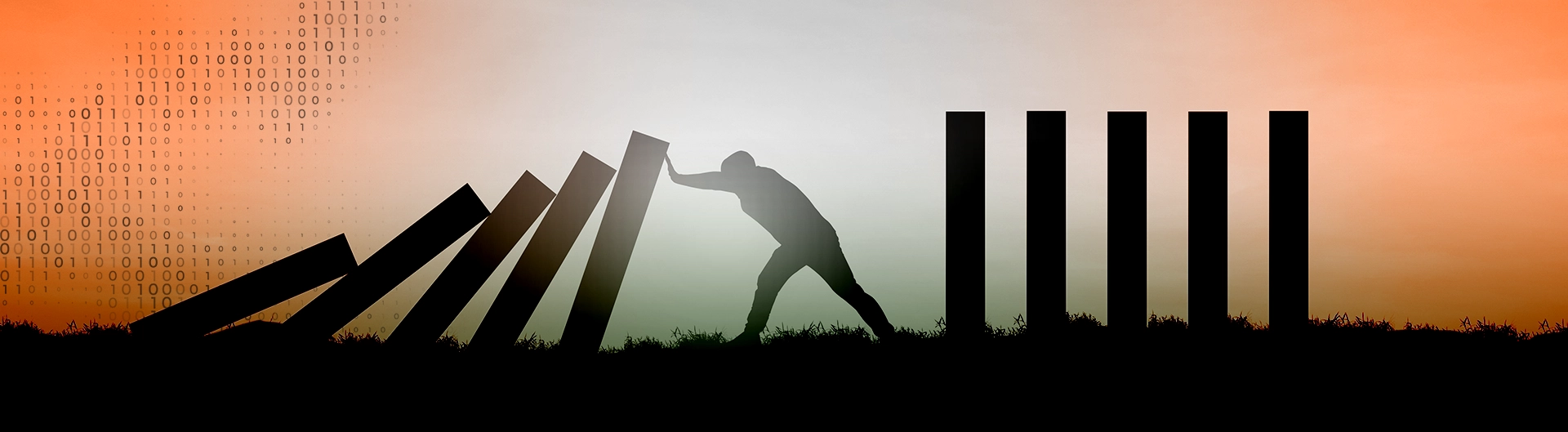 A man's silhouette pushing back falling dominoes, gradient sky