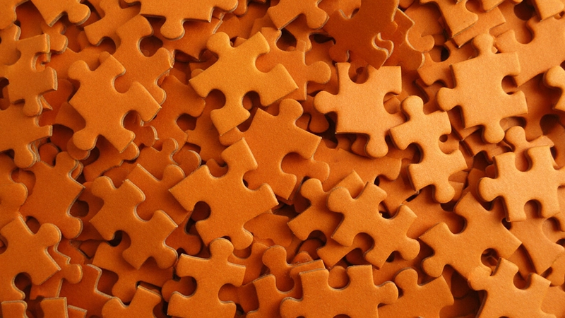 Mixed orange puzzle pieces