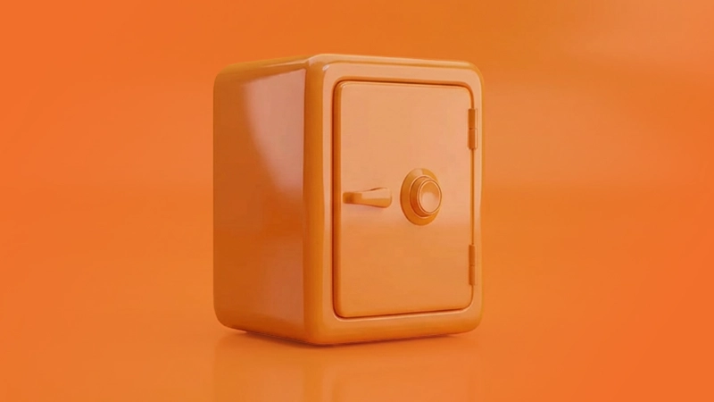 Coffre-fort orange sur fond orange