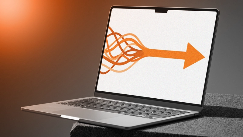 Laptop displaying an orange right arrow